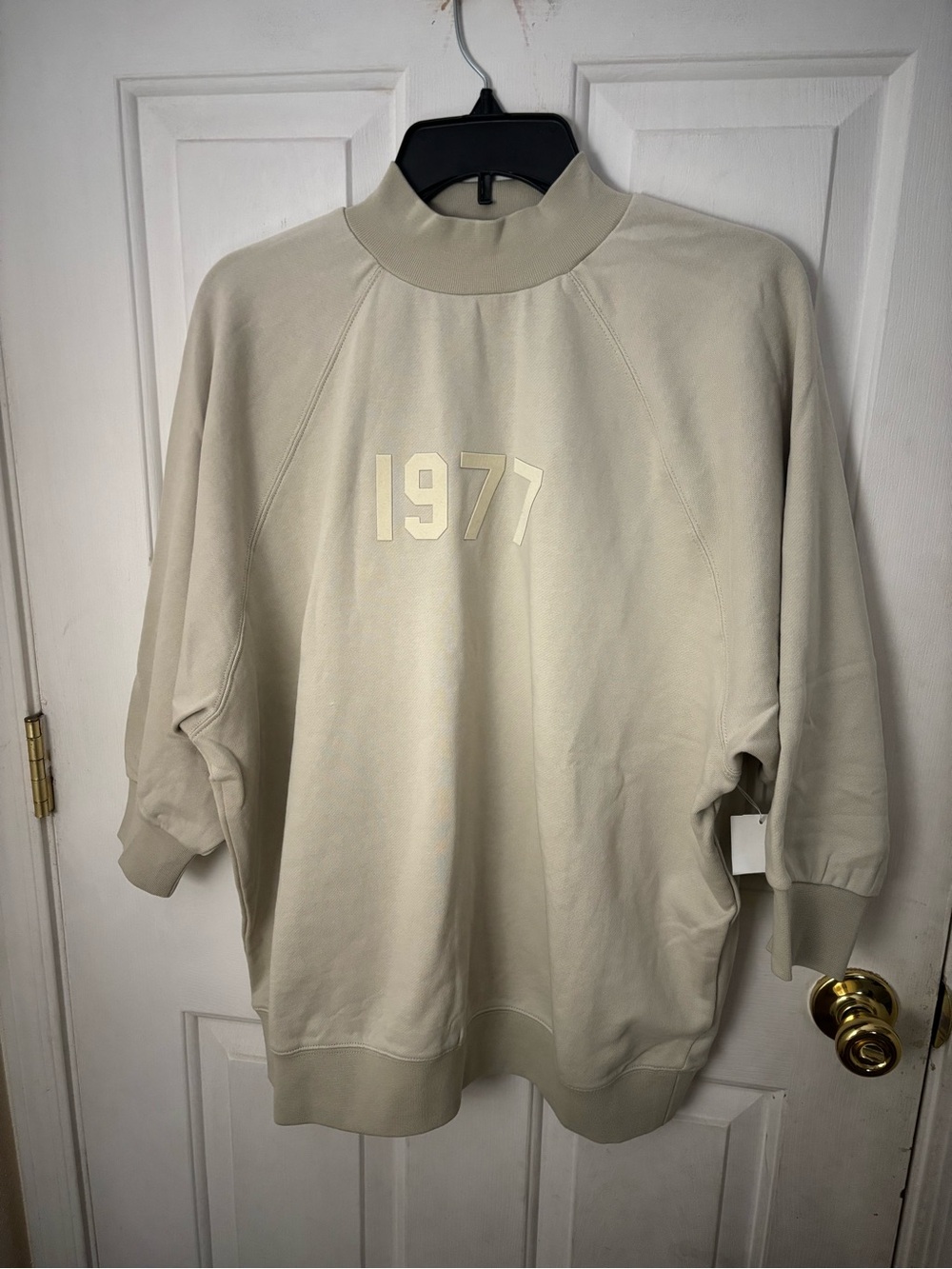 Essentials Cream Mock Neck Sweatshirt with 1977 Graphic NWOT